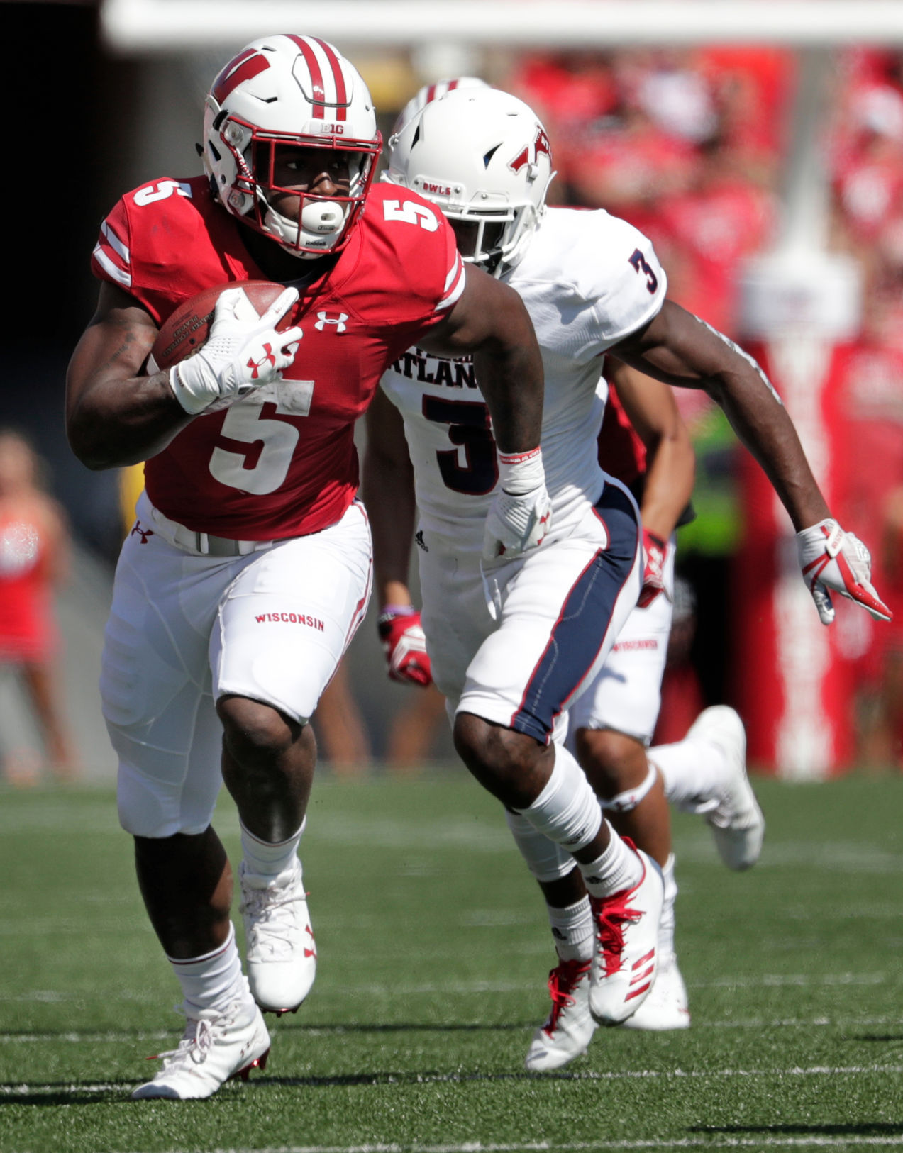 Chris James runs against FAU, State Journal photo